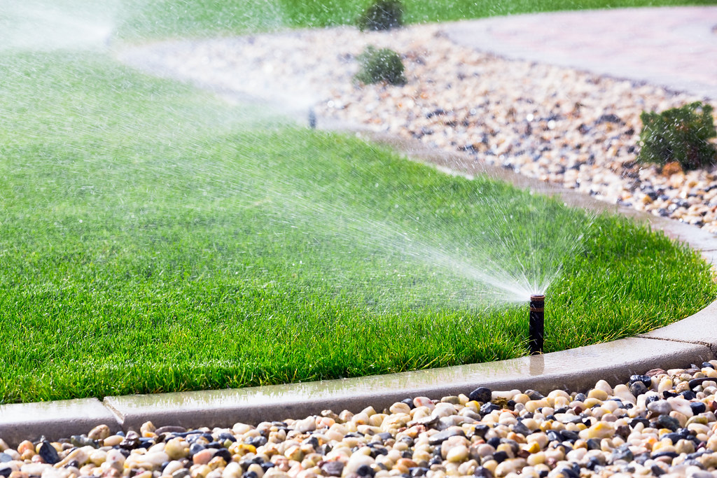 Garden and lawn sprinkler system in use